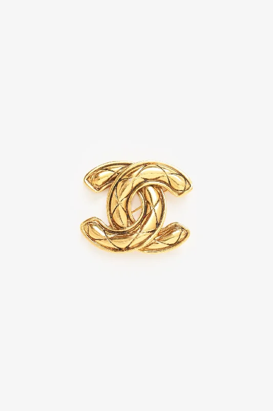 Astrology sign brooches-Pre-Loved Chanel™ Gold Tone Cocomark Matelasse Brooch