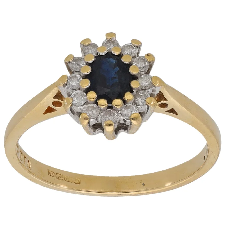 Sleek band rings-18ct Gold Sapphire & 0.12ct Diamond Cluster Ring Size M