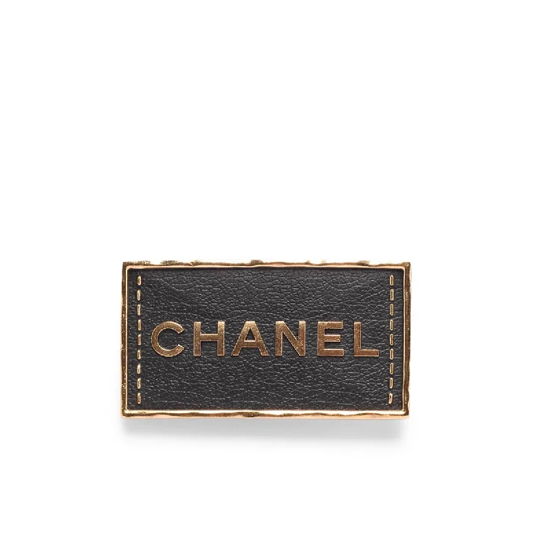 Coral inlay brooches-Chanel Gold & Black Leather Logo Plate Brooch