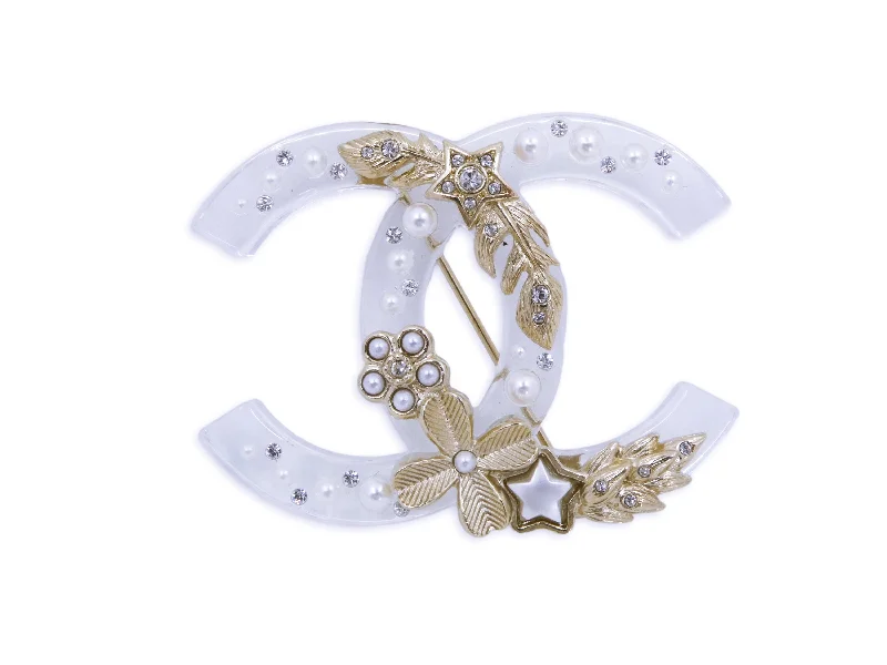 Regency style brooches-Chanel Clear Acrylic Brooch 19K Lucite CC Ornament